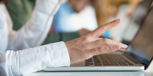 closeup-female-hand-typing-keyboard